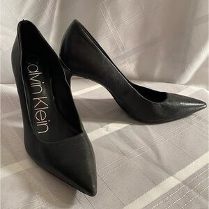 Calvin Klein Women’s Black Dress Pump with Signed  Silver Heel Plate. Size 6.